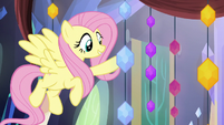 Fluttershy holding a memory jewel S5E3