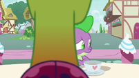 Spike looking around the cafe table S7E15