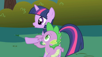 Spike steadies Twilight's hoof S1E01