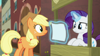 Rarity looking at the flyer S5E16
