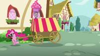 Pinkie Pie moves out from behind the house S5E19