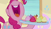 Pinkie Pie presents a tray of cupcakes S8E12