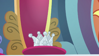 Sibling Supreme crown sitting on throne S9E4