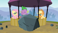 Spike holds a rock S3E09