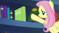 Fluttershy takes more books off the shelf S7E20