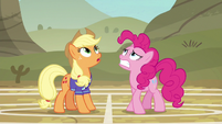 Applejack and Pinkie look up at the softball S6E18