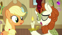 Autumn holding a burning candle S8E23