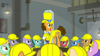 Cheese singing surrounded by workers S9E14