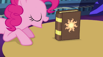 Pinkie Pie points out the book again EG2
