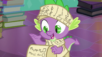 Spike reading one of the items on the checklist S6E2