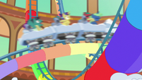 Ponies whizzing by the resort roller coaster S6E20