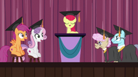 Adult Crusaders at graduation ceremony S9E22