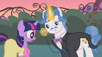 Fancy Pants inspecting Twilight's ensemble.