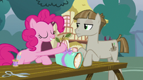 Pinkie Pie giving Mudbriar an olive branch S8E3