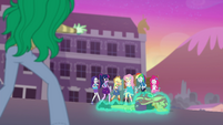 Sunset Shimmer covered in a green glow EGFF