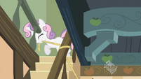 ...while Sweetie Belle controls the other arm.