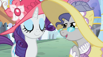 Rarity sure is enjoying the compliments.