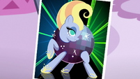 Photograph of pony wearing disco ball dress S7E9