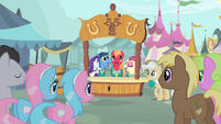 The Ponytones singing in front of a crowd of ponies S4E14