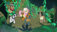 Dr. Caballeron and his team in the jungle S9E21