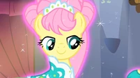 She looks nice with that mane style.