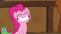 Pinkie Pie grinning happily with the yaks S7E11