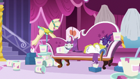 Rarity sulking on her couch with ice cream S7E19