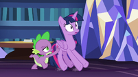 Spike pushing Twilight out the library S7E22