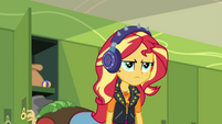 Sunset annoyed by her headphones' uselessness EGDS5