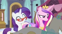 Rarity is proud of her latest creation.