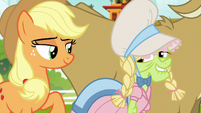 Granny Smith wearing a wig and bonnet S7E19