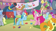 Rainbow Dash knocks pie out of Pinkie's hoof S7E23