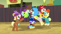 Rodeo clowns jumping through hoops S5E6