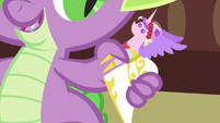 Spike playing with figurine of Cadance S2E25