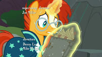 Sunburst frantically looks through Star Swirl's journal S7E26