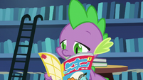 Spike continues reading his comic S5E16