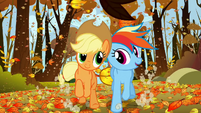 Applejack and Rainbow Dash happily racing fair S1E13