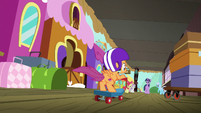 Scootaloo scootering down the station platform S8E6