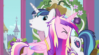 Shining Armor is thinking-"Now is not a good time for hugs."