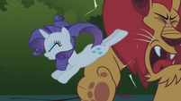 Rarity kicking Manny Roar.