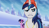 Shining Armor and Twilight Sparkle looking at Ms. Peachbottom S03E12