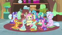 Fluttershy surrounded by students and holding bunnies MLPS3