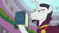 Neighsay holding the EEA guidebook S8E26