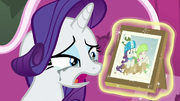 Rarity tearfully looks at sledding photo S7E6