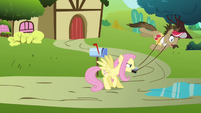 Fluttershy swings Globe Trotter around S2E19