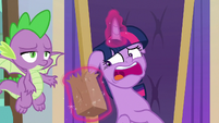 Spike giving Twilight a paper bag S9E1