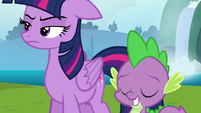 Spike grins amused at Twilight's annoyance S6E25