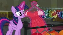 Twilight hanging dresses on the rack S6E9