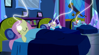 Fluttershy, Rarity, and Rainbow connected to magic threads S5E13