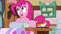 Pinkie Pie stuffing a cake into a box S5E7